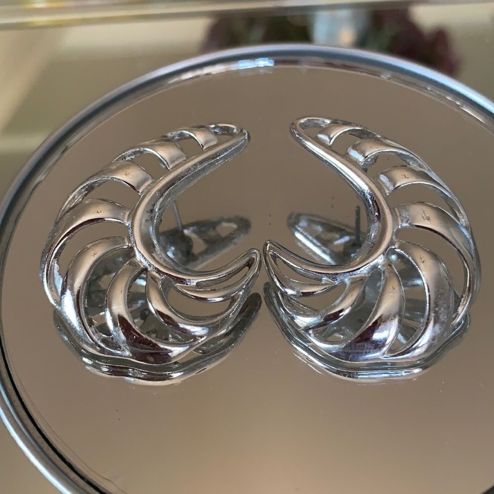 Shiny silver shrimp shaped post earrings